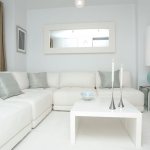 White coffee table in the sitting area of ​​the living room