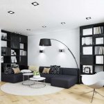 Black furniture in a white living room