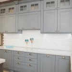 gray kitchen interior with gold handles