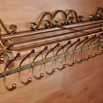 Forged hangers in the hallway wall photos