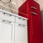 Kitchen with red refrigerator