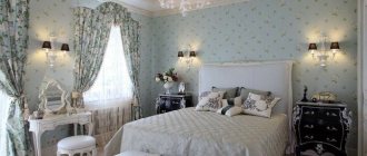 Wallpaper with barely noticeable flowers in pastel colors on the wall in the bedroom