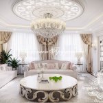 Luxurious living room in a classic style in the residential complex &quot;Rozmarin&quot; with white Italian furniture