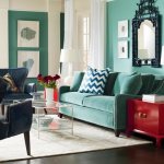 Blue sofa combination with red photo in the interior