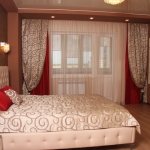 Combination of curtains and bedspreads in the bedroom