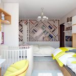 bedroom and children&#39;s room in one room decor photo
