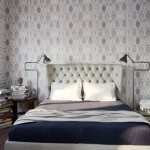 Light gray wallpaper in a small bedroom
